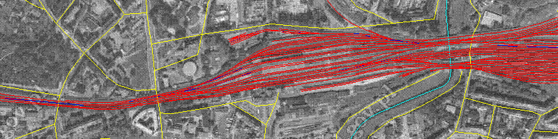 Widok z edytora - Legnica. Czerwone tory, żółte drogi i niebieskie rzeki na tle zdjęcia satelitarnego.